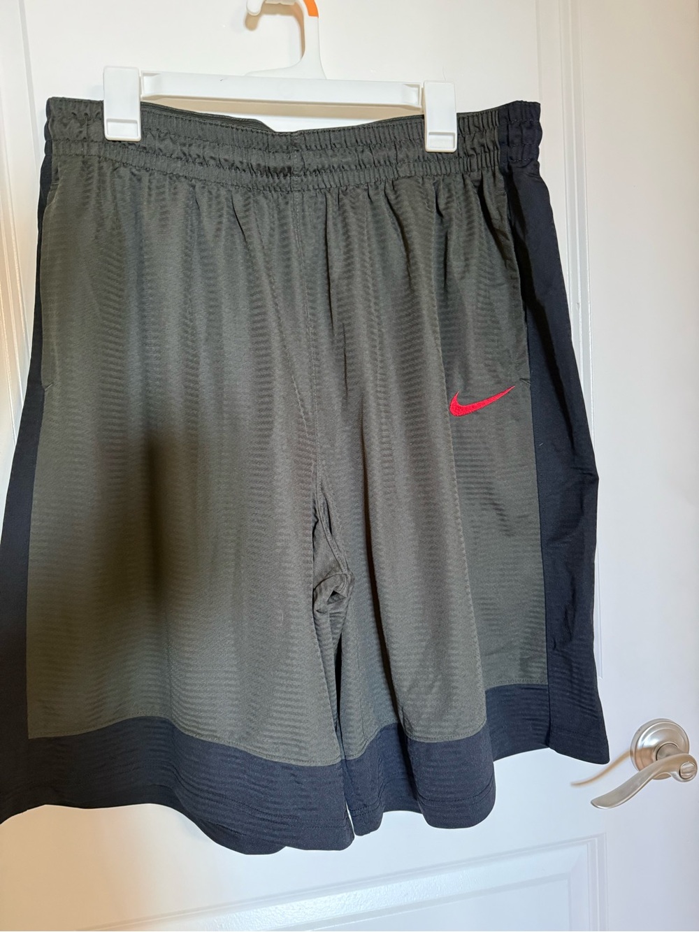 Nike Men's Olive Green Athletic Shorts with Black Panels and Red Swoosh